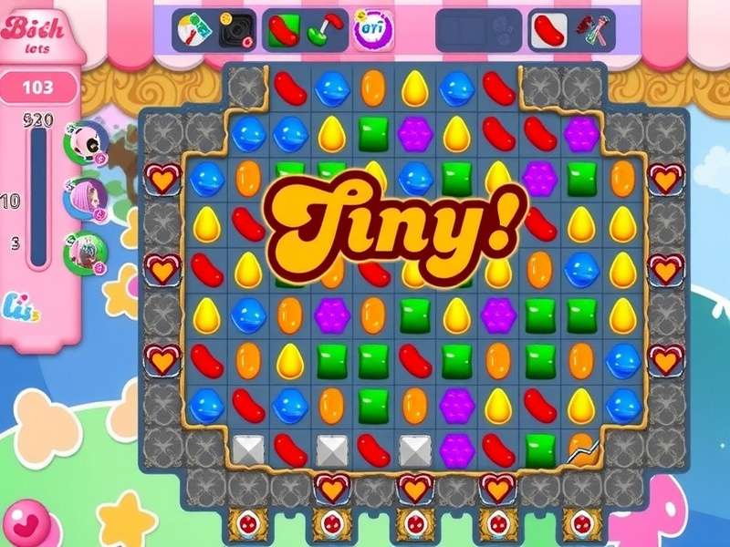 Candy Crush Saga gameplay on Windows 10 laptop screen showing colorful candies and boosters